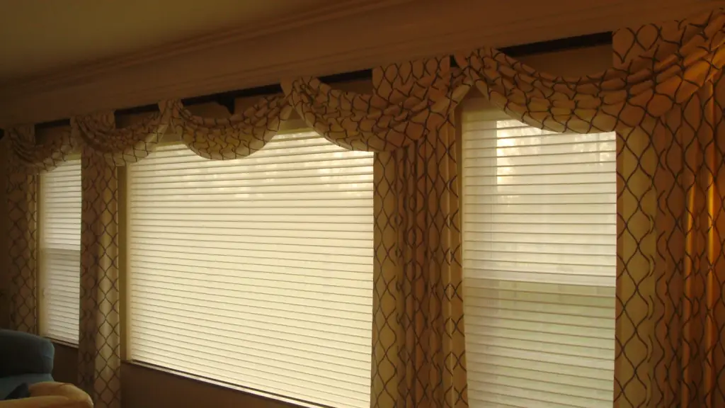 Swag and jabot valances over blinds